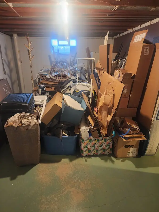 Roll-off dumpster container at job site for 2 Yard Dumpster Rental in Montvale